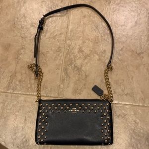 Like New Navy Crossbody bag. Gold accent